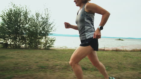 Woman-Jogging-along-Lakeside